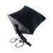 Black inflatable wedge pillow with attached nylon strap and metal handcuffs for secure positioning and restraint.