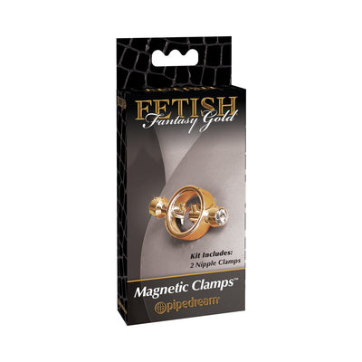 Packaging of Fetish Fantasy Gold Magnetic Nipple Clamps featuring gold-tone clamps with jeweled accents on a sleek black background.