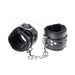 Black faux fur-lined leather cuffs connected by a sturdy silver chain and buckle closures for secure restraint.