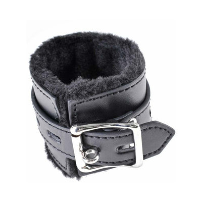 Black faux leather cuff with soft plush lining and silver buckle closure for comfortable restraint.