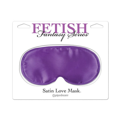 Purple satin eye mask from Fetish Fantasy Series on white packaging with elastic strap for comfort.