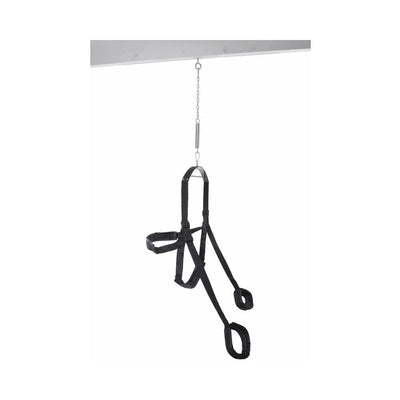 Black adjustable sex swing with padded supports and stirrups, hanging from a ceiling mount with chain and spring.