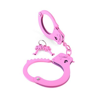 Pink metal handcuffs with two matching decorative keys on a white background.
