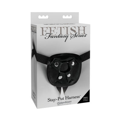 Fetish Fantasy Series Stay Put Harness in black with adjustable straps displayed in white retail packaging.