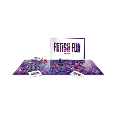 Fetish Fun board game set with game guide, trivia cards, dice, and player pieces on a purple-themed board.