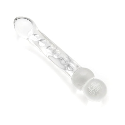 Clear glass dual-ended massage wand with textured shaft and Fifty Shades of Grey logo on one end.