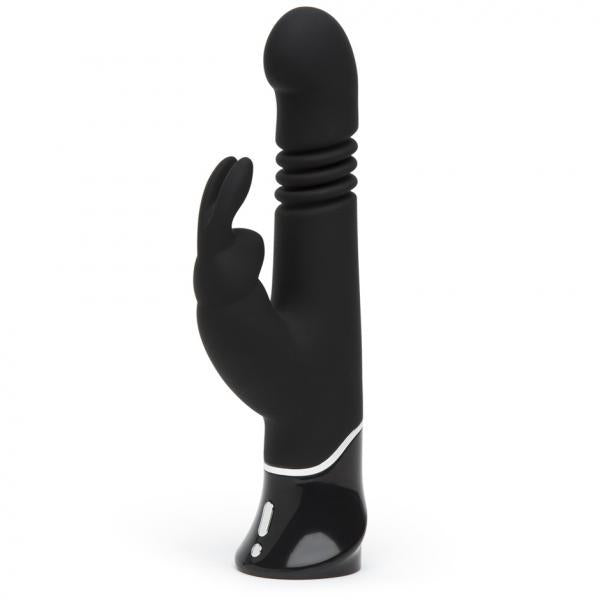 Black rechargeable rabbit vibrator with curved thrusting shaft and dual stimulation ears, sleek silicone finish.