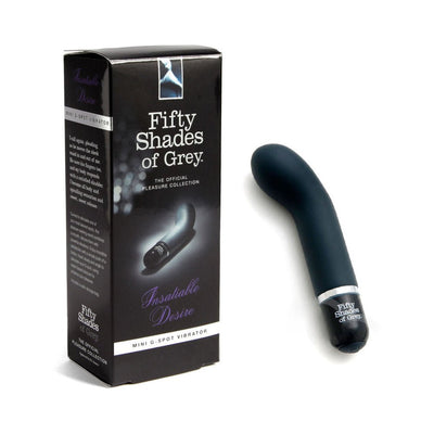 Fifty Shades of Grey Insatiable Desire mini G-spot vibrator in black with curved design and branded packaging box.