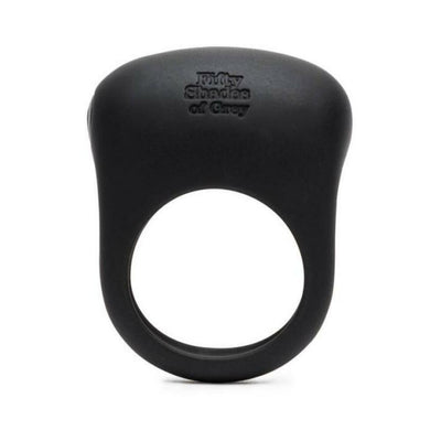 Black silicone vibrating love ring with textured top and Fifty Shades of Grey logo embossed on front.
