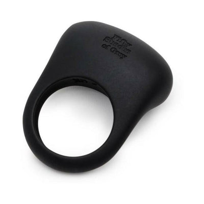 Black silicone vibrating love ring with textured pad and Fifty Shades of Grey logo embossed on top
