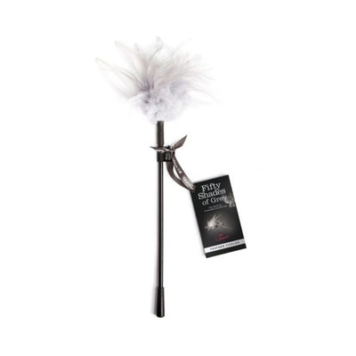 Fifty Shades of Grey feather tickler with soft white feathers and black handle, featuring branded tag and ribbon.