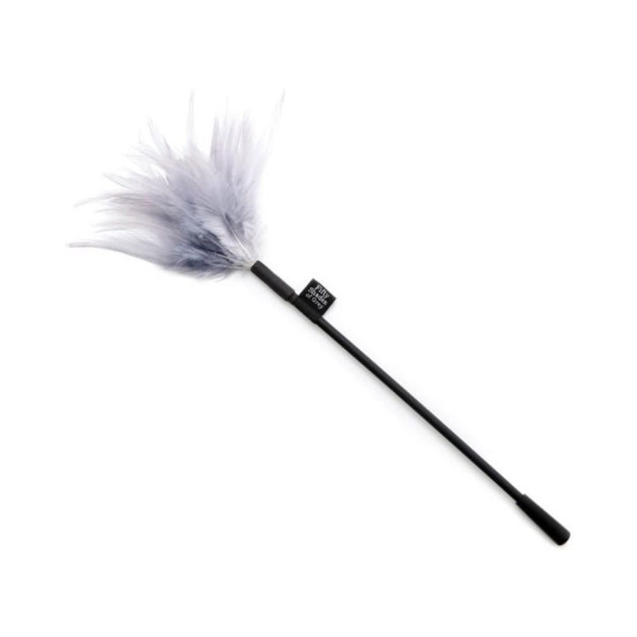 Fifty Shades of Grey feather tickler with soft grey feathers and a slim black handle for gentle sensory play.