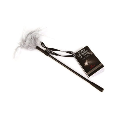 Fifty Shades of Grey Tease Feather Tickler with soft grey feathers and black handle on white background.