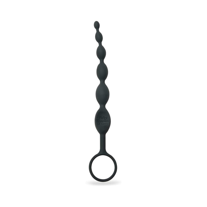 Black silicone anal beads with graduated sizes and a loop handle, branded Fifty Shades of Grey.
