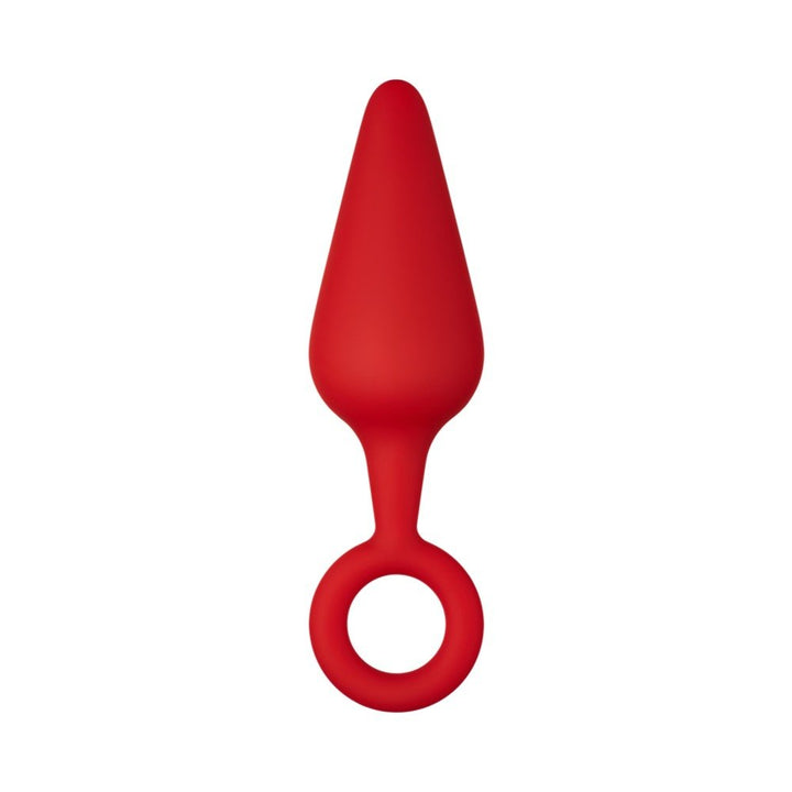 Red silicone plug with tapered shape and circular pull ring base on white background.