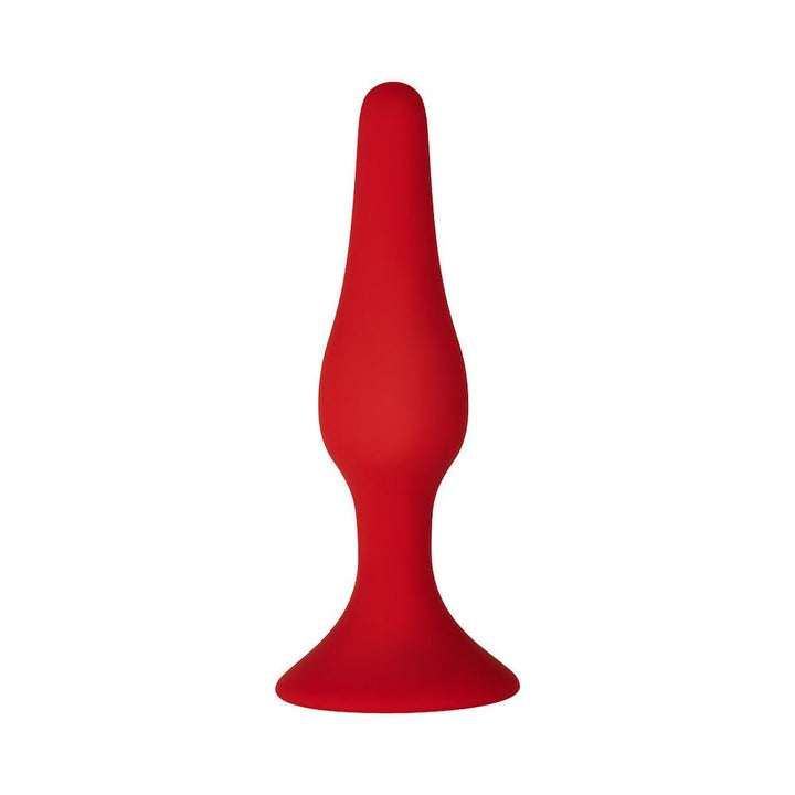 Red silicone flexible plug with a tapered shape and sturdy suction cup base for secure placement.