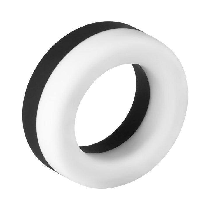 Two-tone black and white liquid silicone C-ring with smooth, stretchy design for comfort and durability.