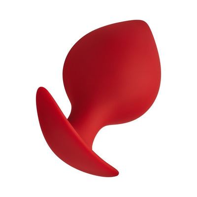 Red silicone spade-shaped plug with ergonomic flared base for comfortable and secure use.