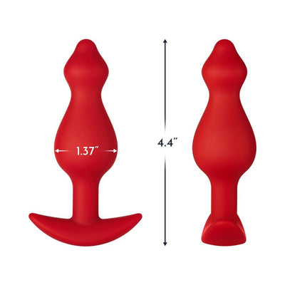 Red silicone medium-sized plug with tapered tip and flared base, measuring 4.4 inches long and 1.37 inches wide.
