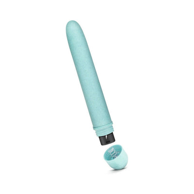 Light green biodegradable vibrator with removable cap showing battery compartment spring detail on white background