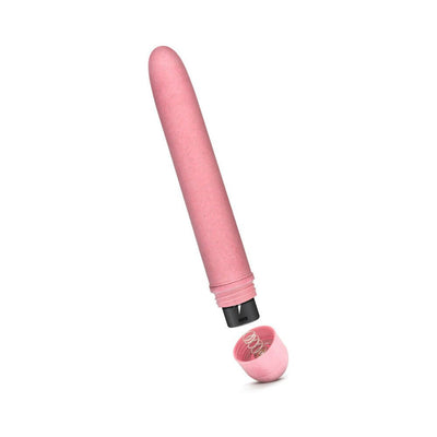 Pink biodegradable vibrator with removable cap showing battery compartment spring on white background