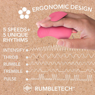Hand holding coral pink ergonomic vibrator with heart-shaped fin, showing 5 speeds and 5 vibration patterns on textured background.