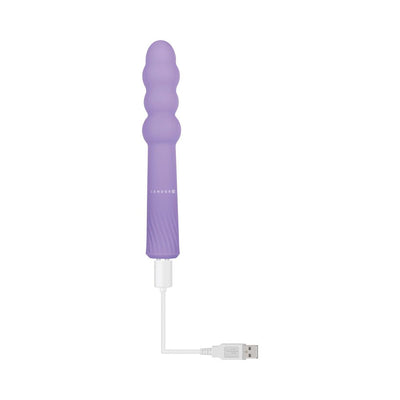 Purple beaded vibrating wand with USB magnetic charging cable on white background.