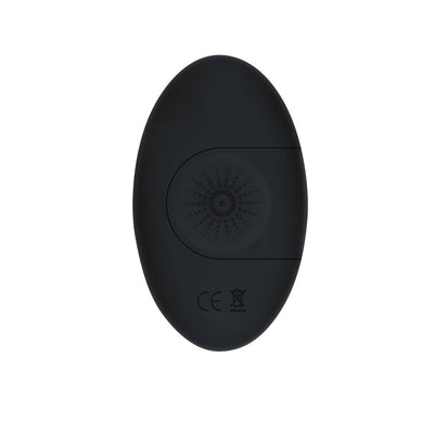 Black oval-shaped remote control with textured circular button and certification markings on white background.