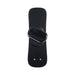 Compact black magnetic vibe resting on a sleek black remote control with power button and LED indicators.