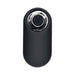 Black compact remote control with a single power button and silver accent ring for a rechargeable vibe.