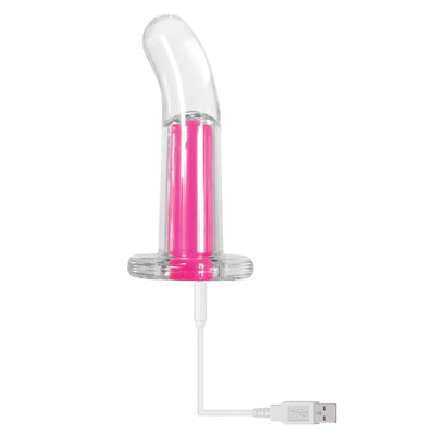 Clear curved vibrator with hot pink inner bullet and USB charging cable attached on white background.