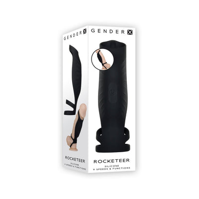 Packaging box of Gender X Rocketeer black silicone vibrating penis sheath with product image and usage illustration.