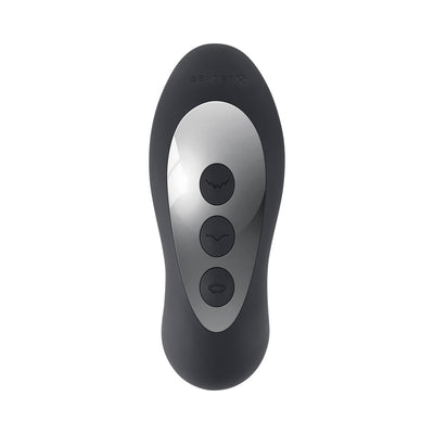 Black and silver ergonomic remote control with three buttons for Gender X The Mad Tapper vibrator functions.