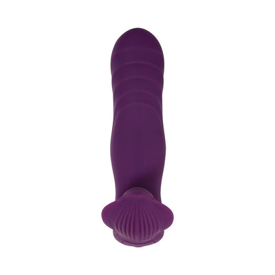 Purple silicone wearable vibrator with textured shaft and stingray-shaped external stimulator, shown from above on white background.