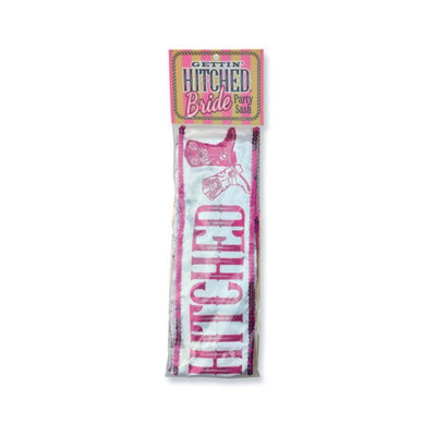 Packaged white bridal sash with pink glitter lettering reading "Gettin' Hitched Bride Party Sash" and cowboy boot graphics.