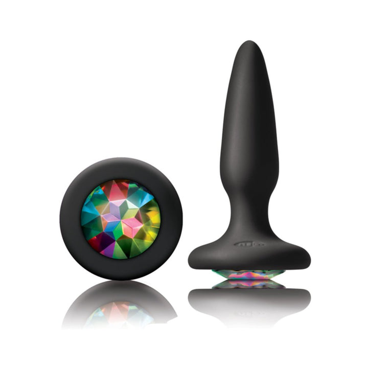 Black silicone mini butt plug with a colorful rainbow gem base, shown upright and from the base view.