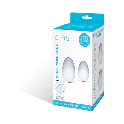 Glas 2-piece glass yoni egg set packaging showing smooth teardrop-shaped eggs and luxury satin storage bag included.