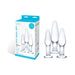 Three-piece frosted glass anal training set with tapered shapes and flat bases beside product packaging.