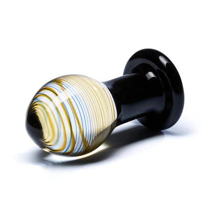 Glas Galileo glass butt plug with swirled yellow and blue bulb and glossy black base on white background.