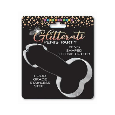 Stainless steel Glitterati penis-shaped cookie cutter on black packaging with gold accents and product details.