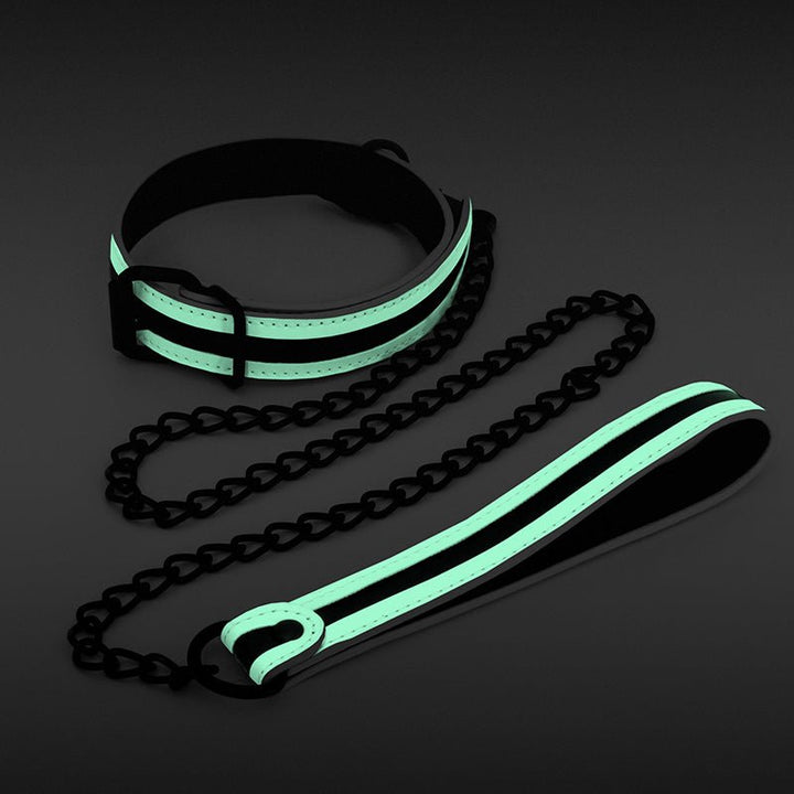 Glow-in-the-dark green bondage collar and leash set with black chain and PU leather accents.