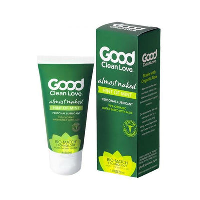 Good Clean Love Almost Naked Hint of Mint personal lubricant tube and green box with organic aloe and bio-match technology branding.