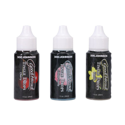 Three 1 fl. oz. bottles of GoodHead Tingle Drops in Cherry, Cotton Candy, and French Vanilla flavors with white caps.