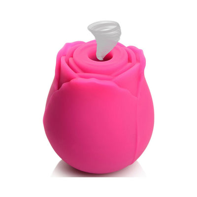 Pink rose-shaped clitoral vibrator with suction feature and soft silicone texture on white background.