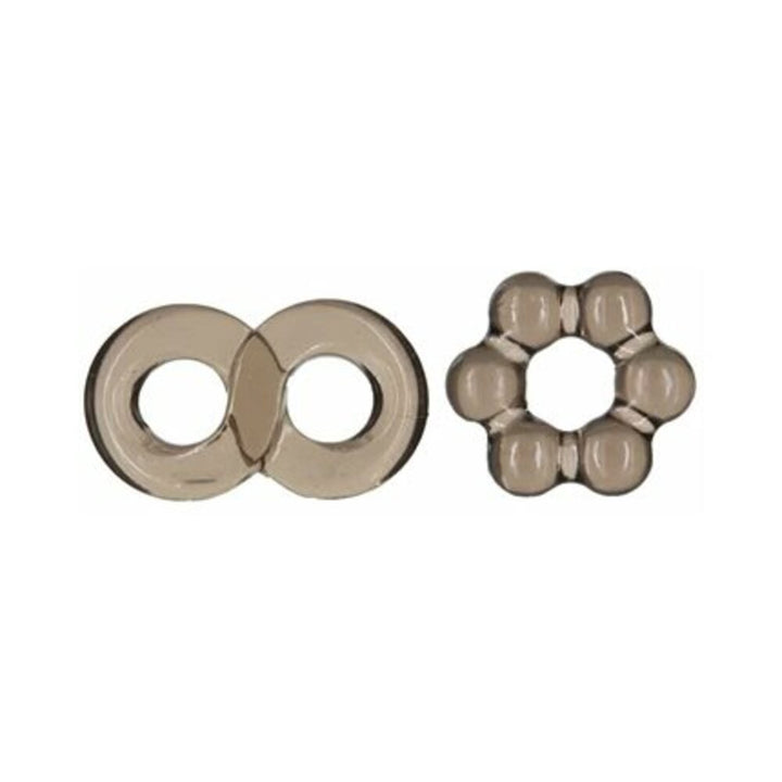 Two smoke-colored stretchy cock rings in different shapes, one smooth and one textured with rounded nodules.