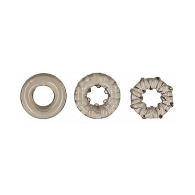 Three smoky translucent cock rings in varying textures and shapes displayed on a white background.