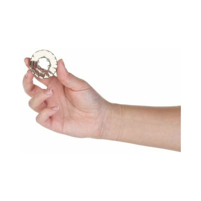 Hand holding a translucent smoky textured cock ring from the Got Big Dick 3-pack set against a white background.