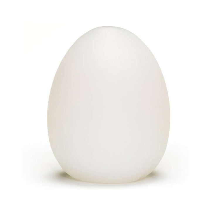 Frosted white egg-shaped self-lubricating sleeve with smooth, semi-translucent surface.