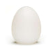 Frosted white egg-shaped self-lubricating sleeve with smooth, semi-translucent surface.