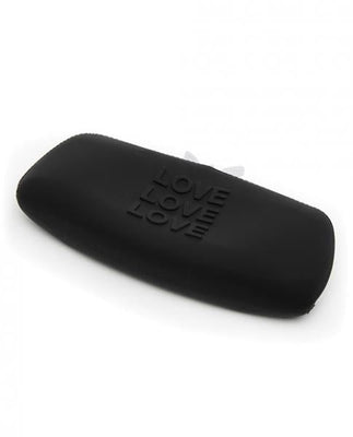 Medium black silicone storage bag with embossed LOVE text, zip closure, and flexible shape for discreet toy storage.